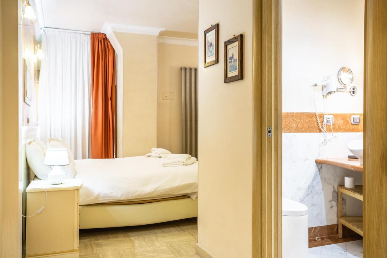 Luxury Inn Opera Rome Bagian luar foto